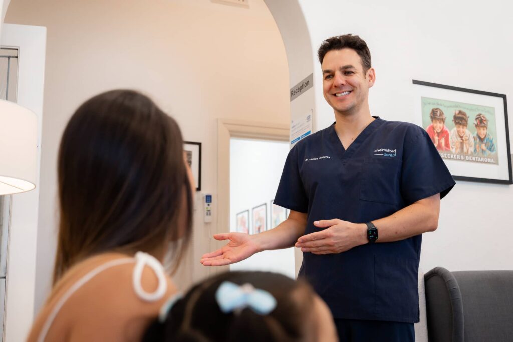 dentist welcoming patient