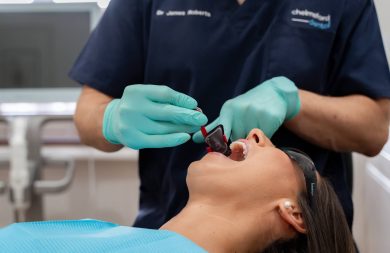 Dr. James from Chelmsford Dental preparing a dental bridge procedure with a patient